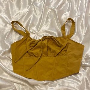 Never warn mustard yellow top